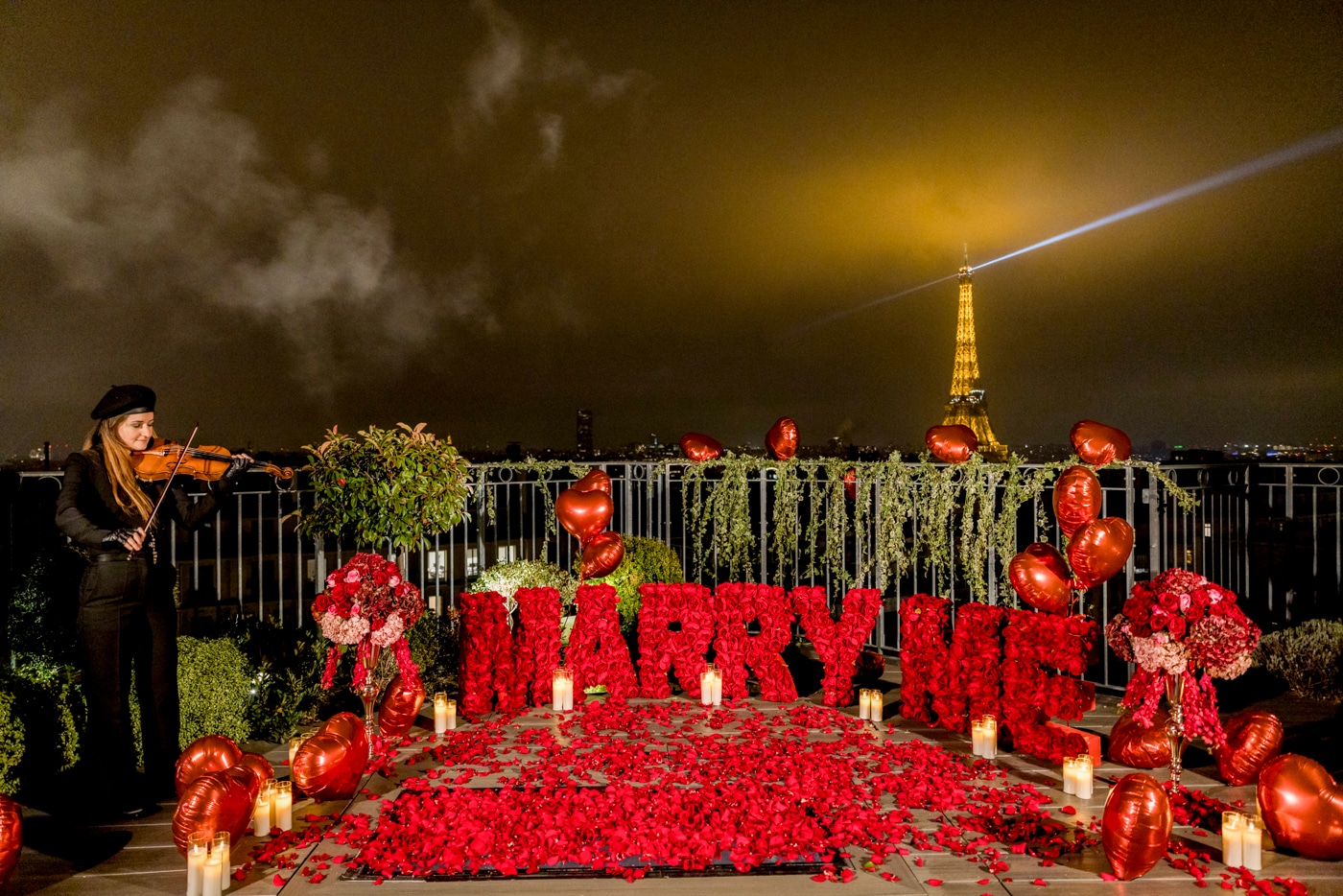 red marry me letters at Le confidentiel rooftop