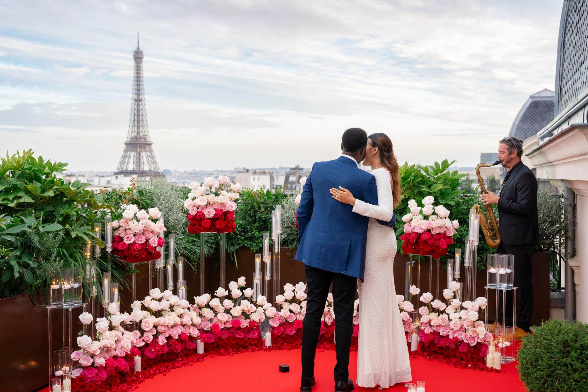 Luxury proposal at The Peninsula Paris rooftop with Eiffel Tower view and live music